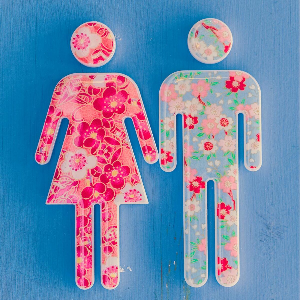 multicolored floral male and female icons